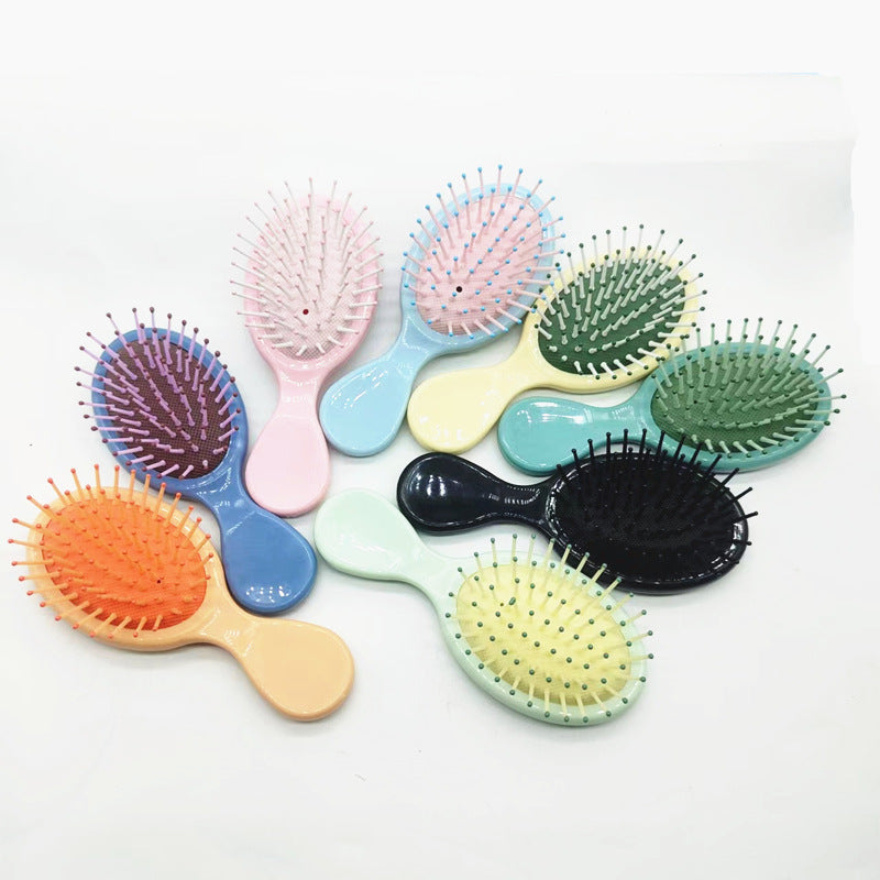 Hair comb with ergonomic handle Bowlift