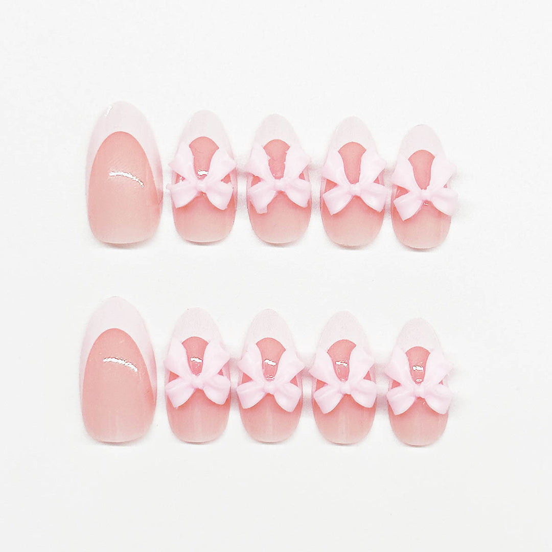 Nail art set with playful bow accents Bowlift
