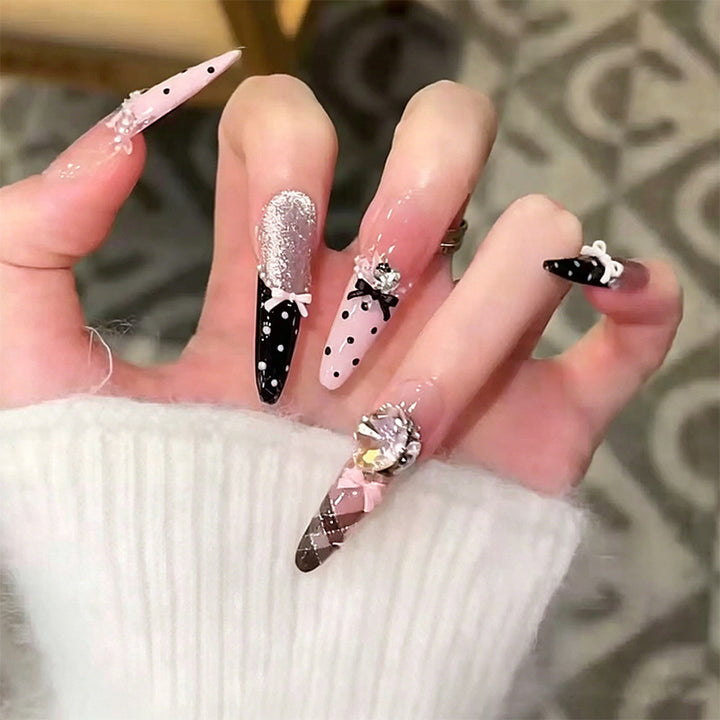 Artificial nail set with glamorous 3D applications and festive design Bowlift