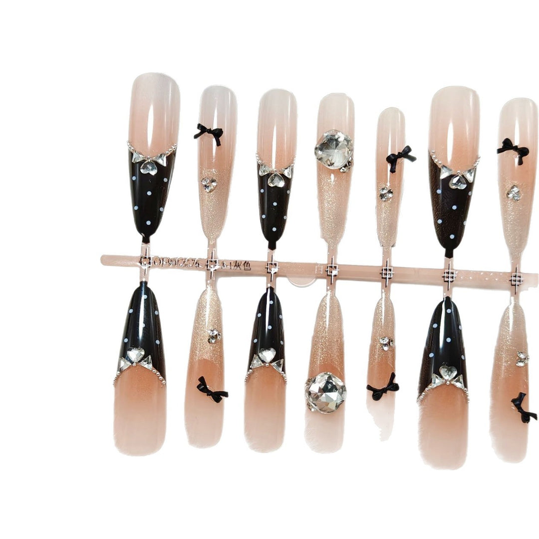 Artificial nails with glamorous rhinestone details Bowlift