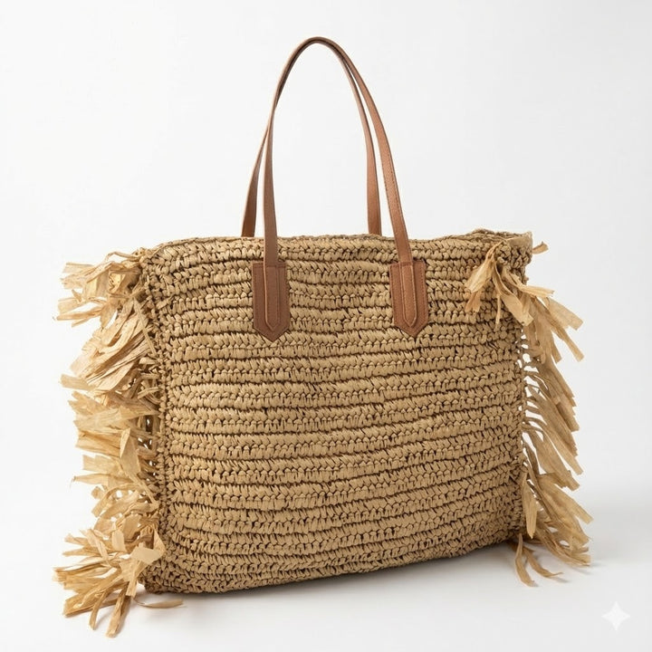 Beach bag with fringed design and sturdy leather handles Bowlift