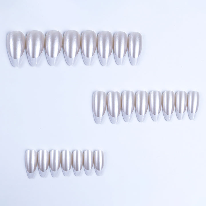 Artificial nails in elegant French tip design Bowlift