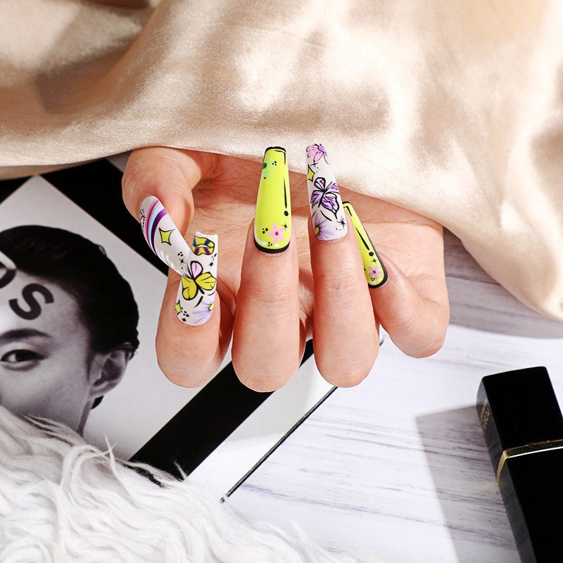 Artificial nails in creative flower design Bowlift
