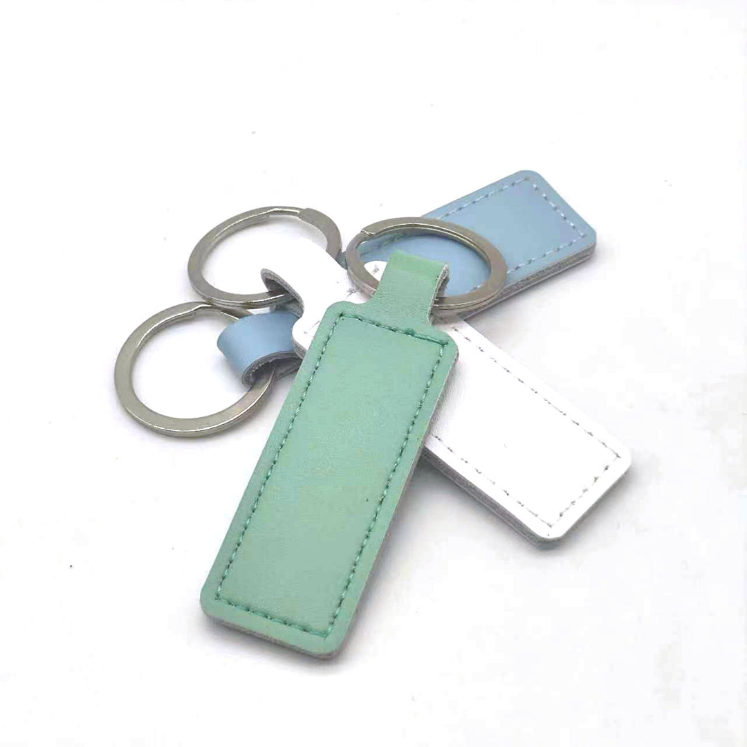 Unisex keychain with customizable faux leather Bowlift