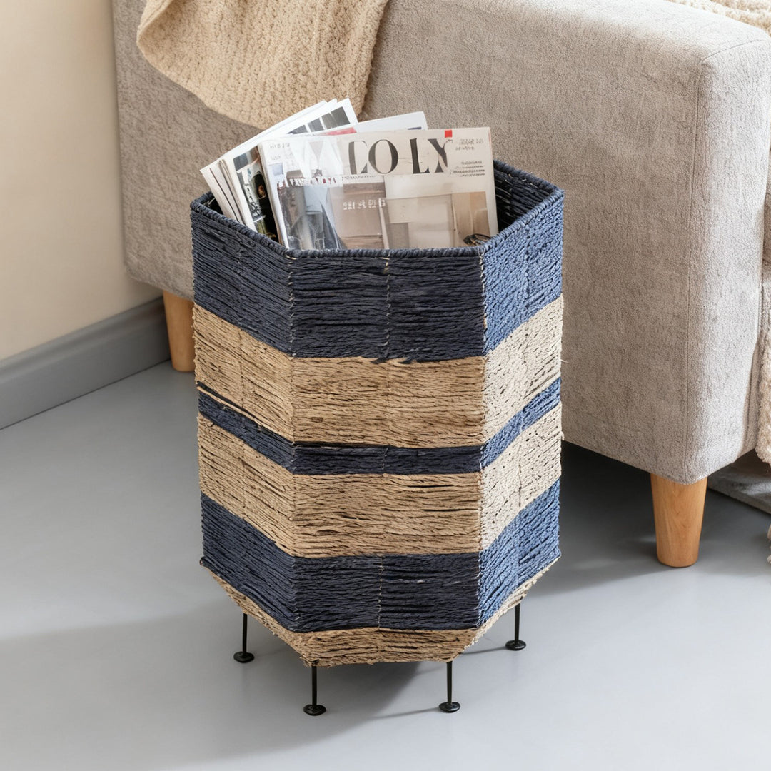 Stylish laundry basket made of rattan with metal legs Bowlift