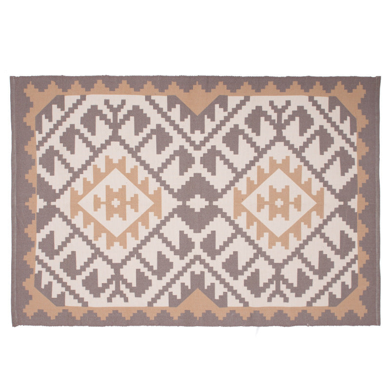 Flat-woven rectangular rug for living and entrance areas with quatrefoil pattern Bowlift