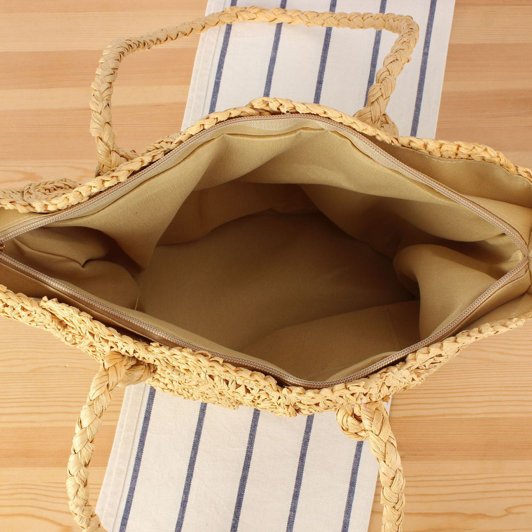 Hand-knotted beach bag with decorative motif Bowlift