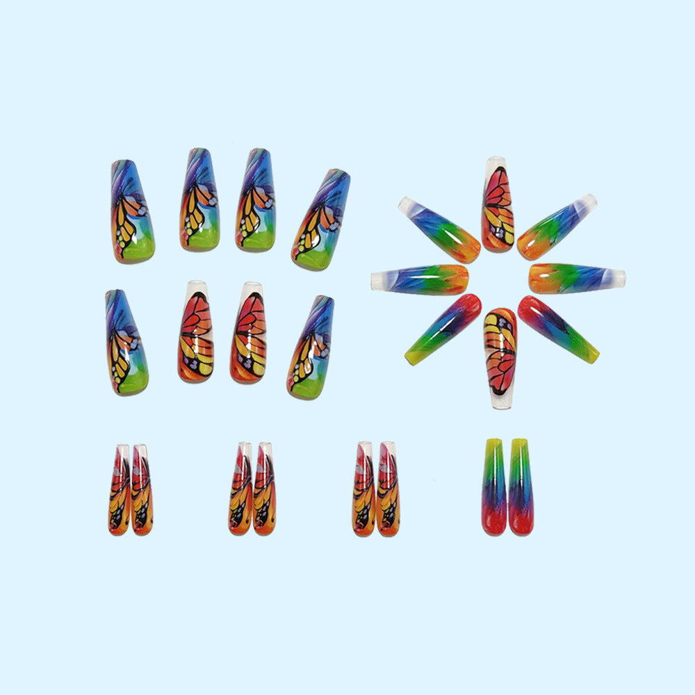 Artificial nails with colorful butterfly design and holographic accents Bowlift