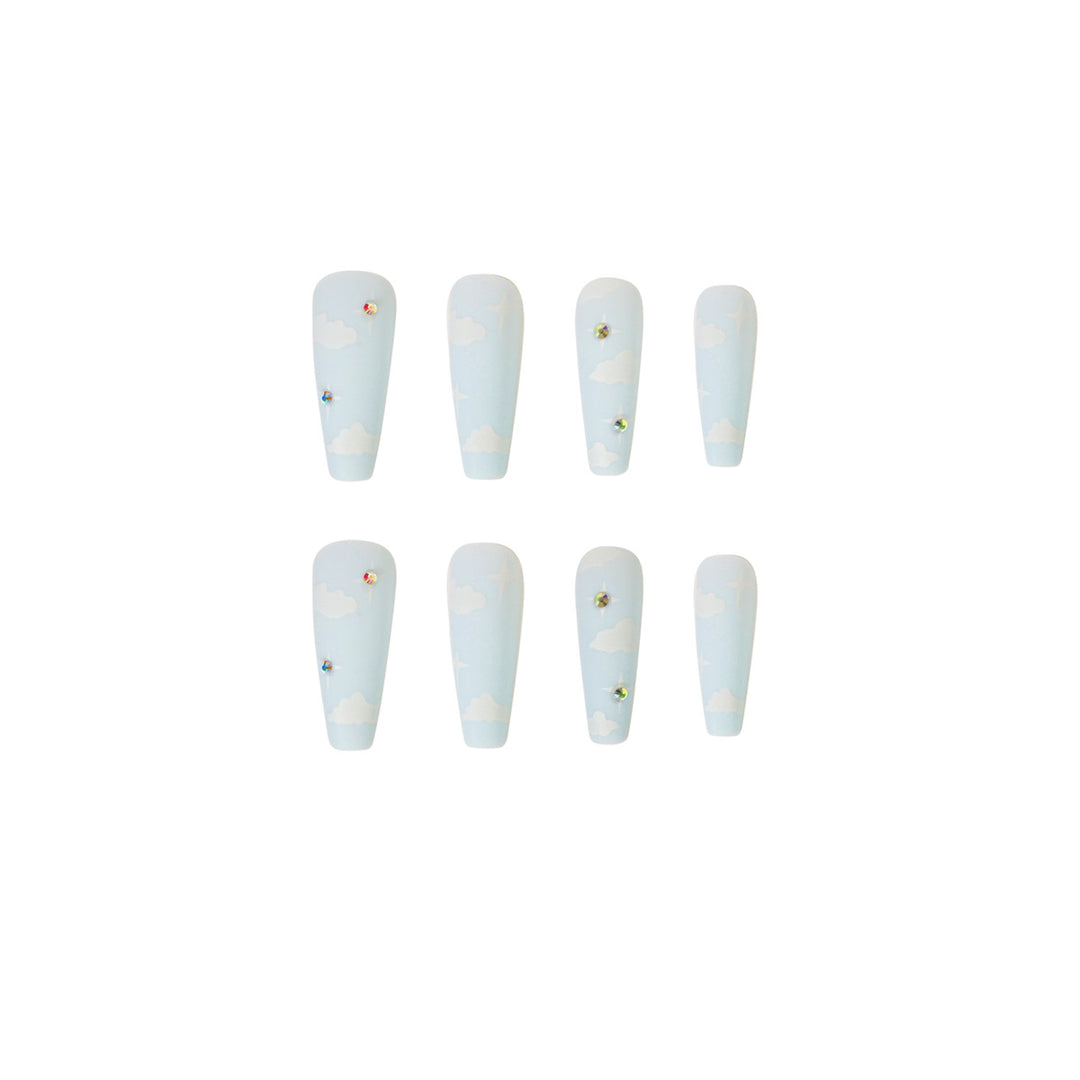Creative nail art in cloud design with glitter accents Bowlift