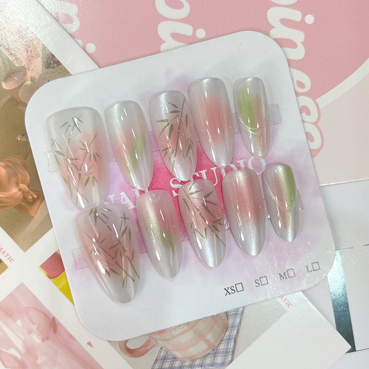 Artificial nail tips with elegant design and botanical accents Bowlift
