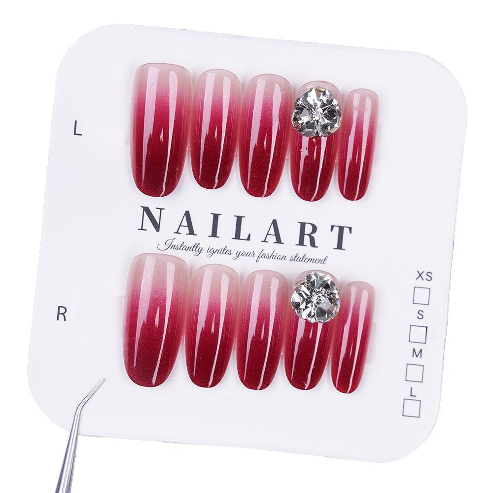 Artificial nails with elegant ombre effect and rhinestone decoration Bowlift