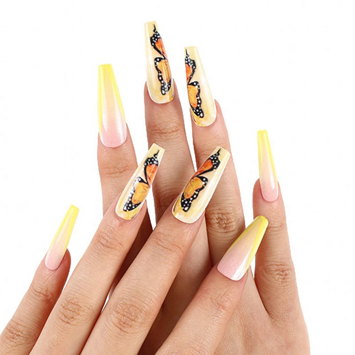 Art nails with butterfly motif Bowlift