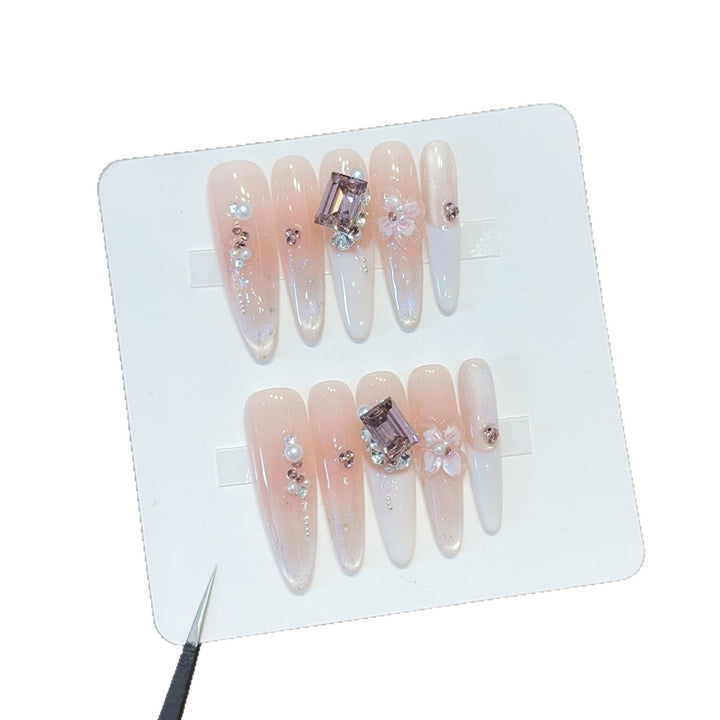 Artificial nails with elegant jewelry details Bowlift