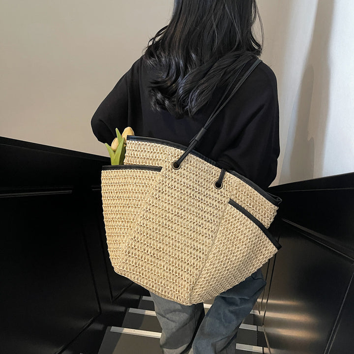 Spacious basket bag with fine leather accents Bowlift
