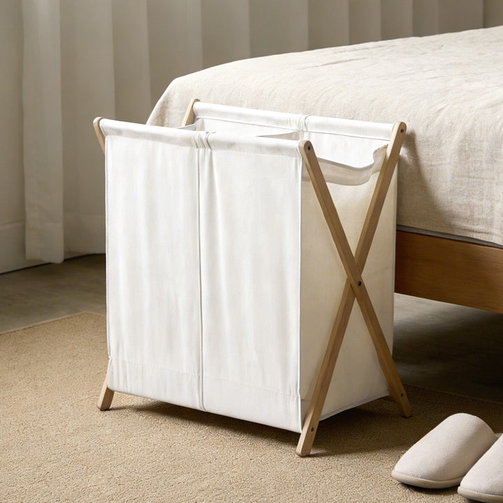 Modern laundry basket with folding frame Bowlift