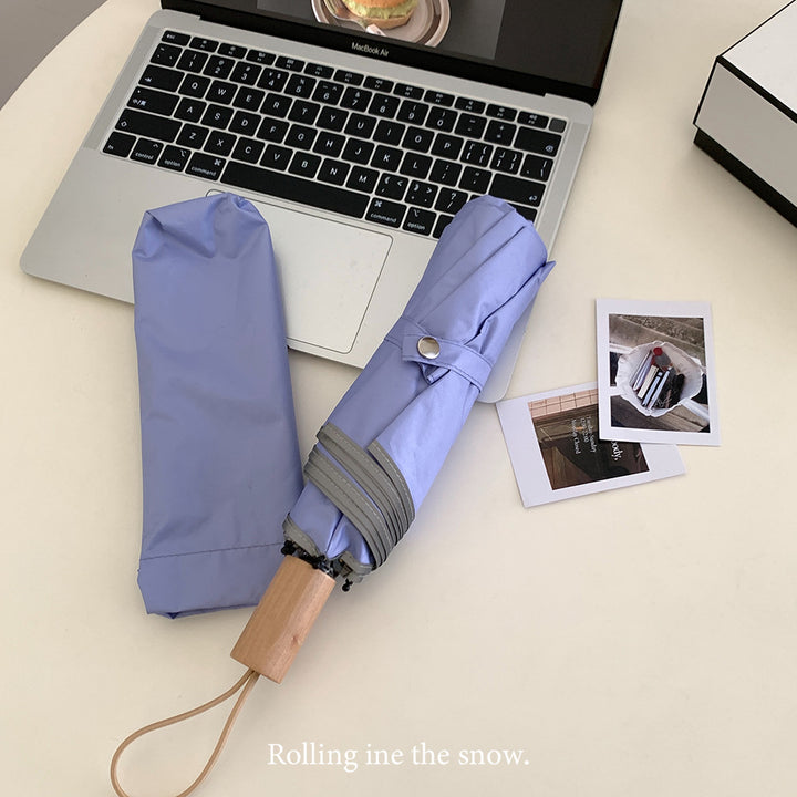 Women's automatic folding umbrella with elegant design and ergonomic wooden handle Bowlift