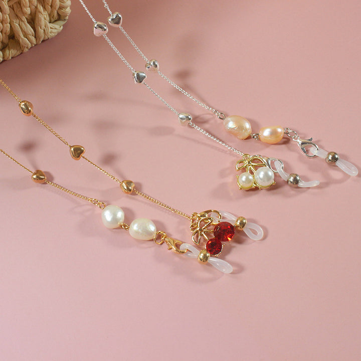 Elegant jewelry ribbon with pearls and silver accents Bowlift