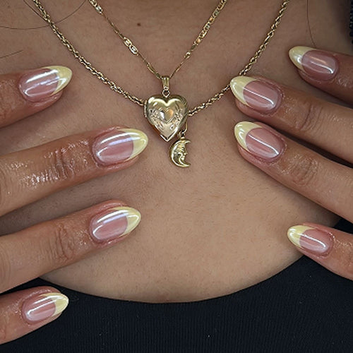Elegant and refined nail art with shimmering French-tip Bowlift