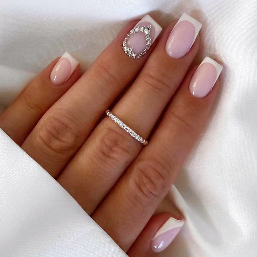 Artificial nail set with elegant French design and rhinestone embellishments Bowlift