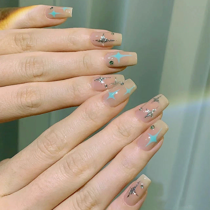 Acrylic nail set with sparkling star and glitter elements Bowlift