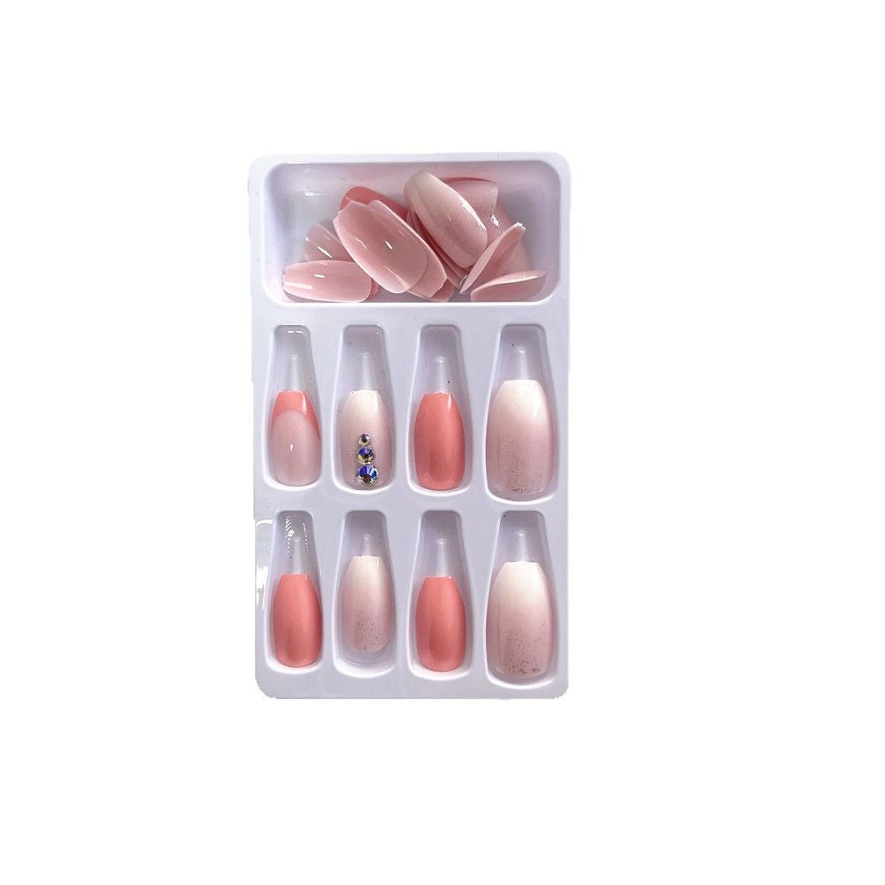 Elegant artificial nails with glitter accents and gradient Bowlift