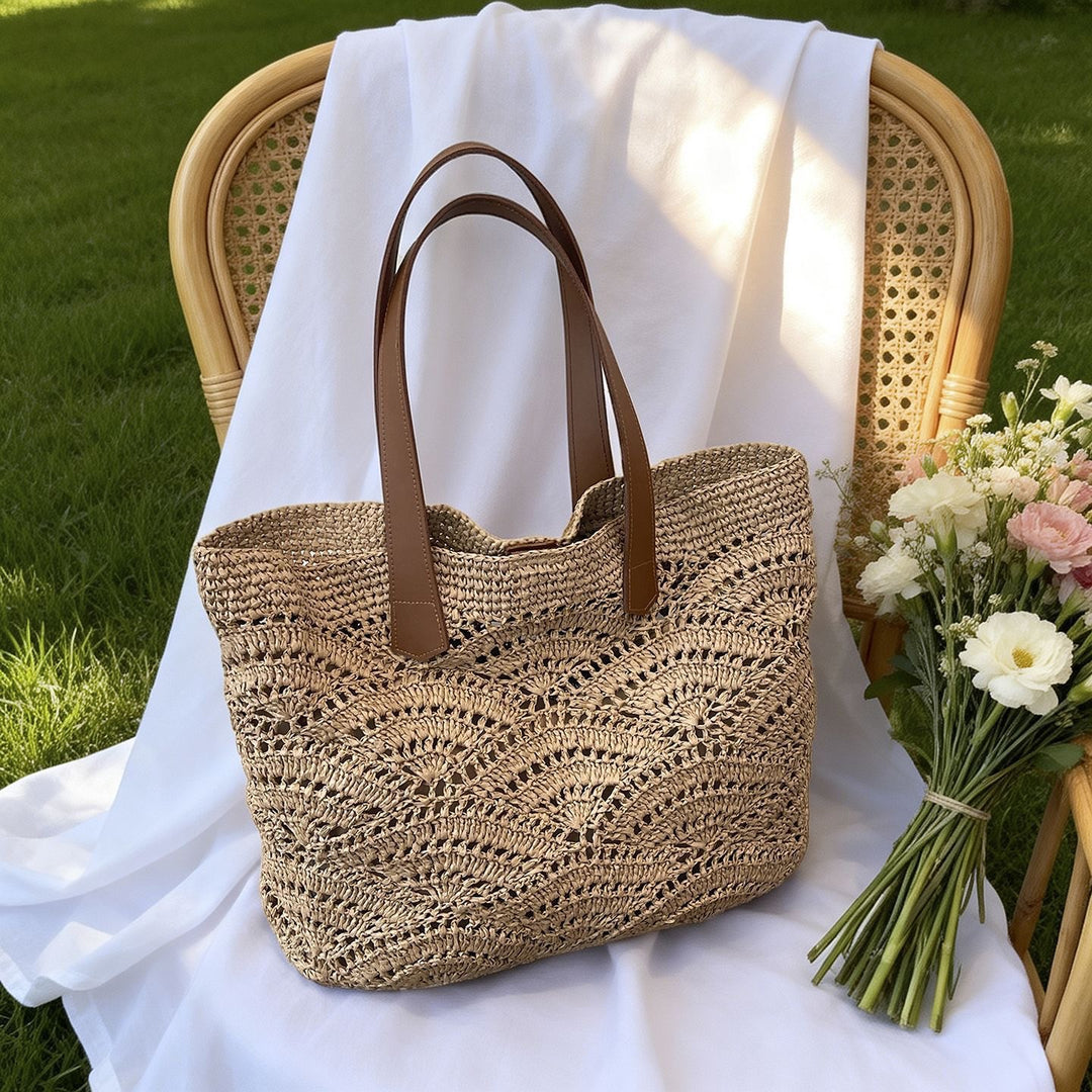 Handbag made of high-quality woven natural material with elegant leather handles Bowlift