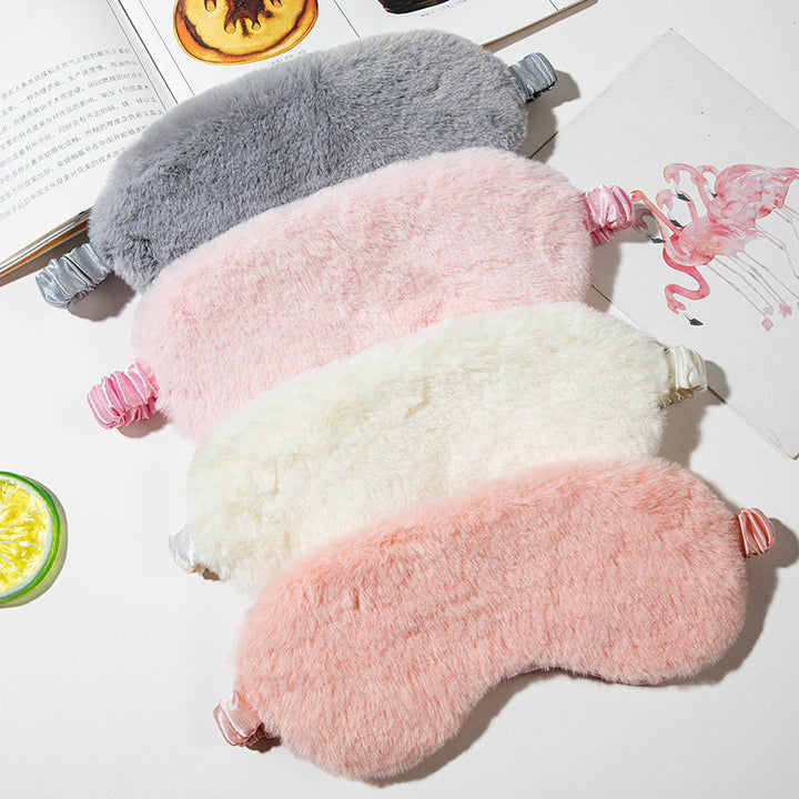 Women's fluffy ergonomic eye mask with adjustable satin band and soft faux fur cover Bowlift