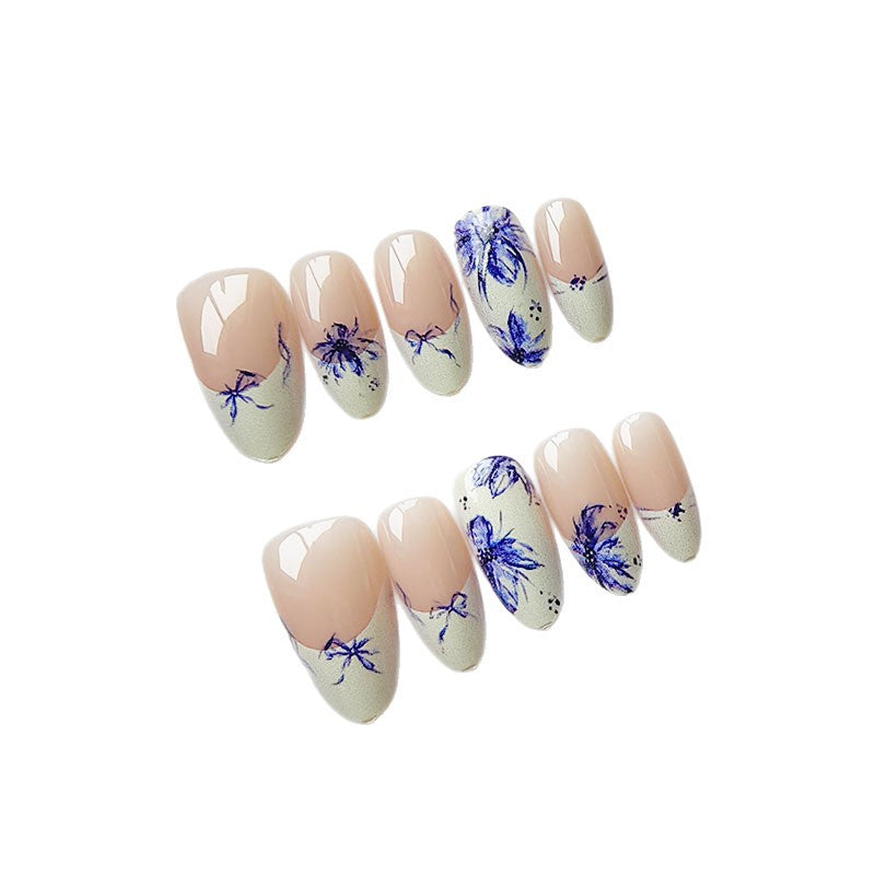 Artificial nails with floral pattern and elegant accents Bowlift