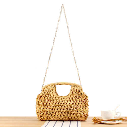 Fine straw shoulder bag with elegant chain accents Bowlift