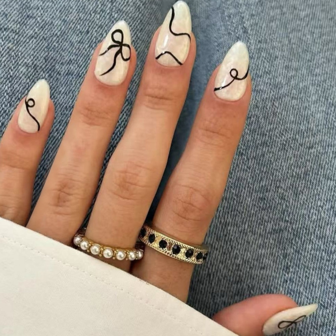 Artful stiletto nails with elegant design and creative details Bowlift