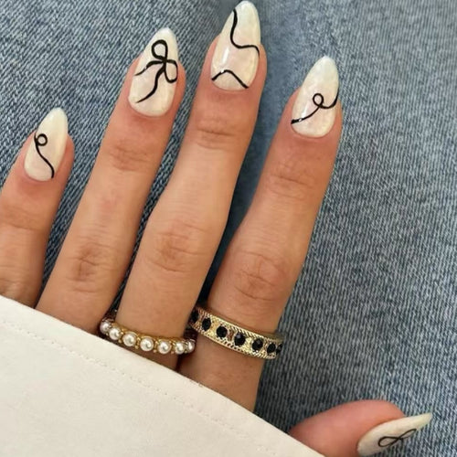 Artful stiletto nails with elegant design and creative details Bowlift