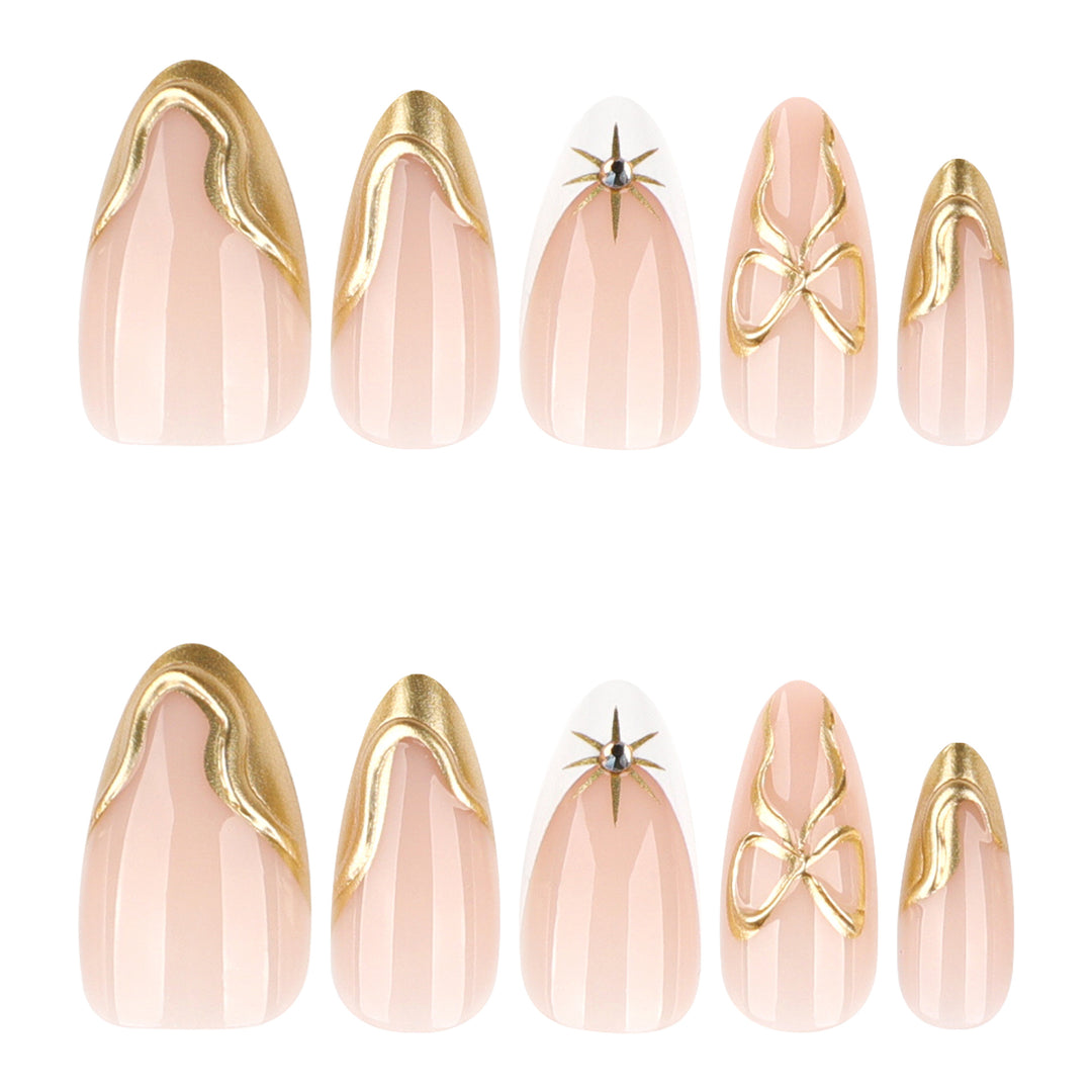 Artistic stiletto nails with elegant gold accents Bowlift