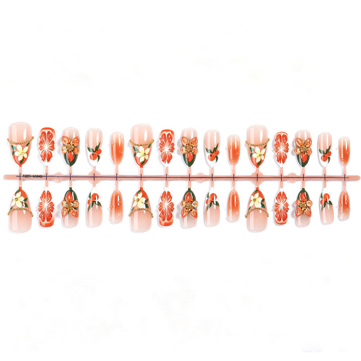 Artificial nail set with colorful flower and glitter accents Bowlift