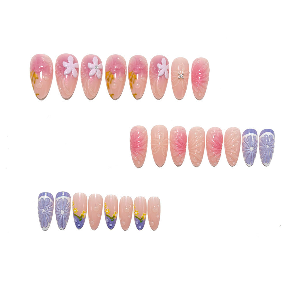 Artificial nail set with floral design and 3D effects Bowlift