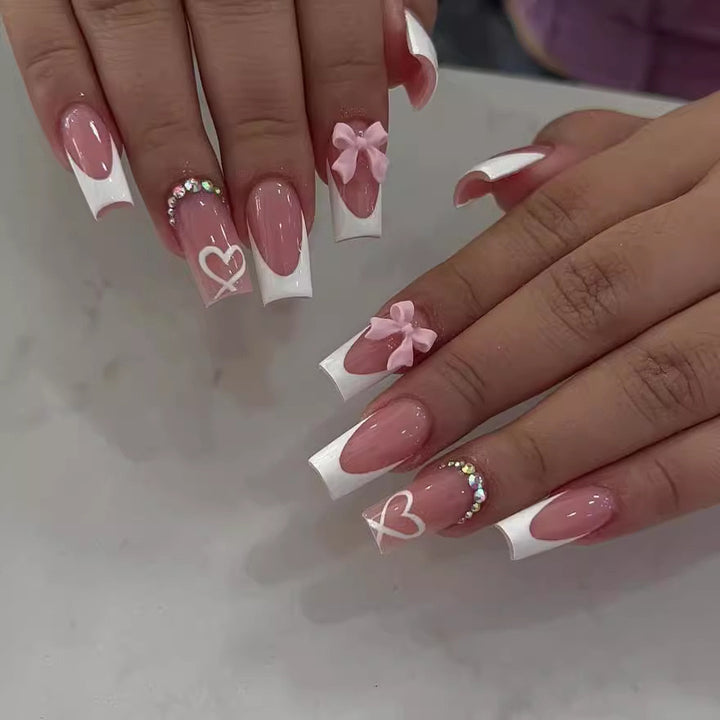 Nail art set with elegant 3D bows and rhinestone embellishments Bowlift