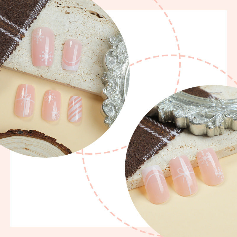 Nail set with elegant floral and striped designs Bowlift