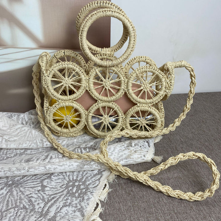 Artisan woven basket bag with striking wheel pattern Bowlift