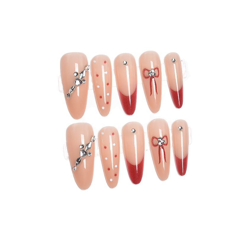 Artistic Press-On Nail Extensions with Decorative Patterns Bowlift