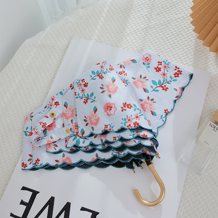 Women's elegant automatic folding umbrella with floral details Bowlift