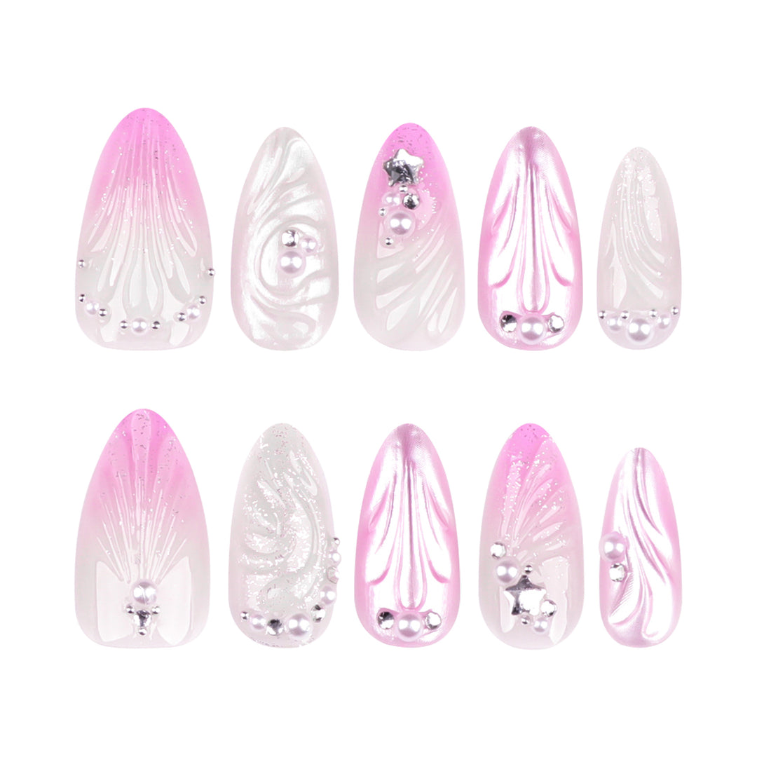 Artificial nail art with elegant swirl design and pearl embellishments Bowlift