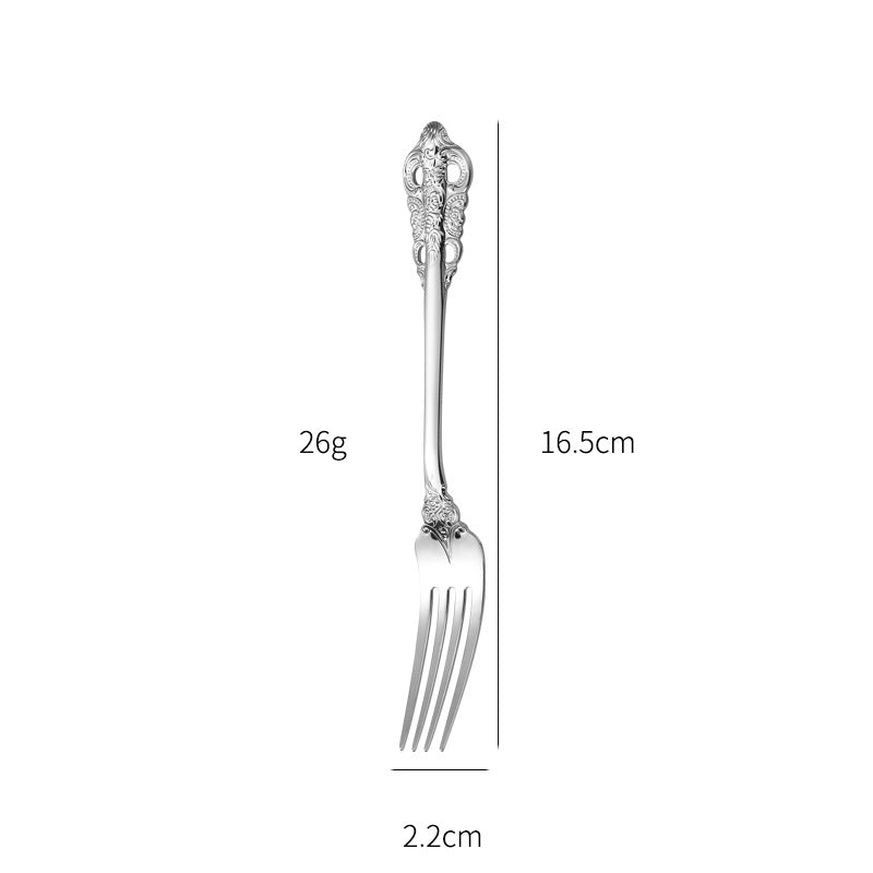 Elegant fish fork with artistic handle design Bowlift