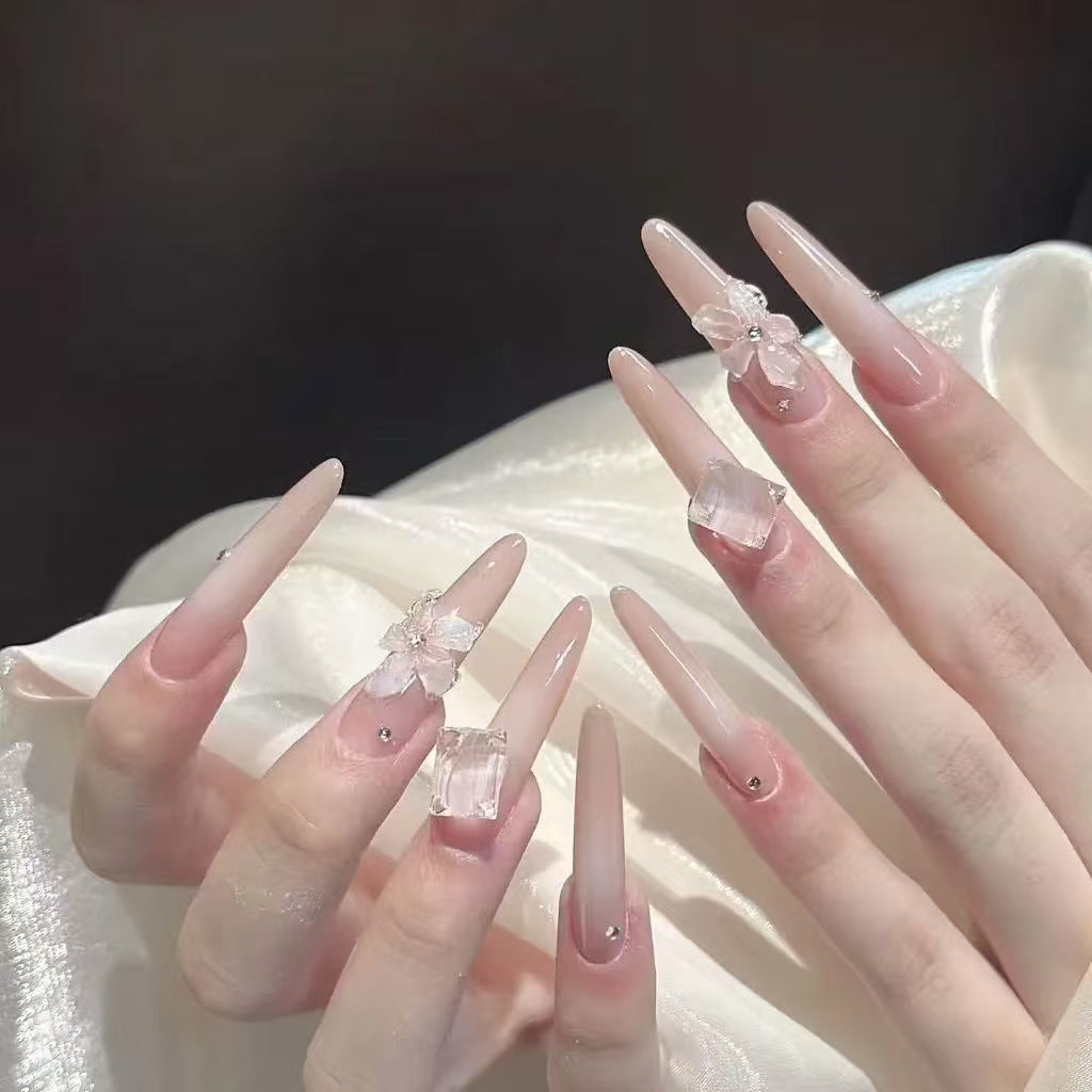 Artistic Stiletto Press-On Nail Art with Glimmering Accents Bowlift