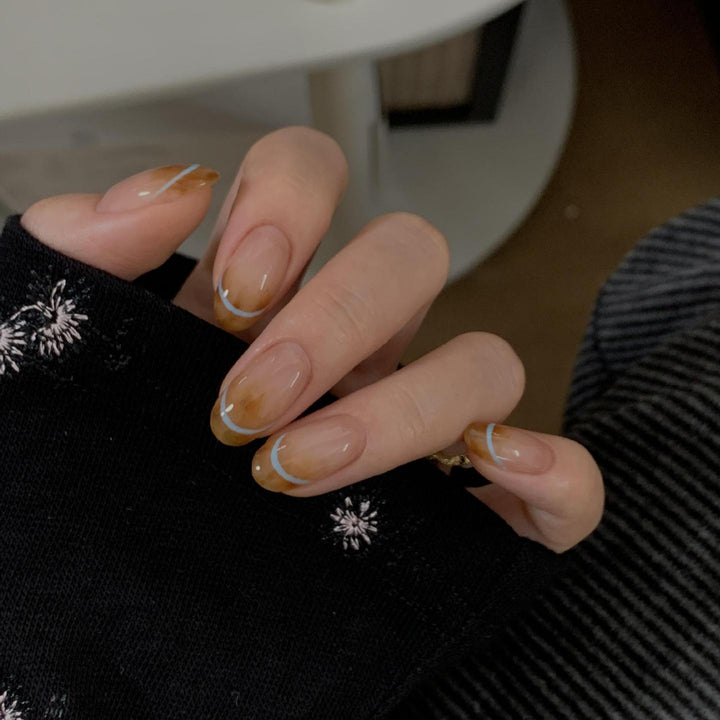 Artificial nails with modern French manicure design Bowlift