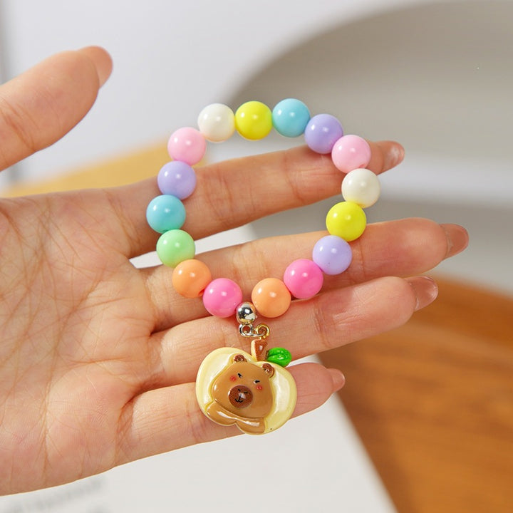 Colorful children's bracelet with crafted pendant Bowlift