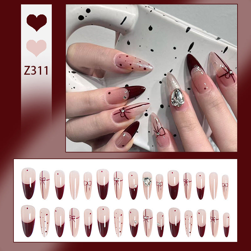 Artificial nail set with elegant bow and glitter details Bowlift