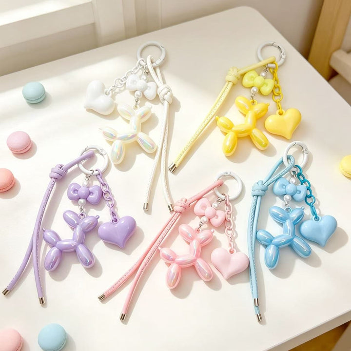 Playful keychain with heart and balloon dog Bowlift