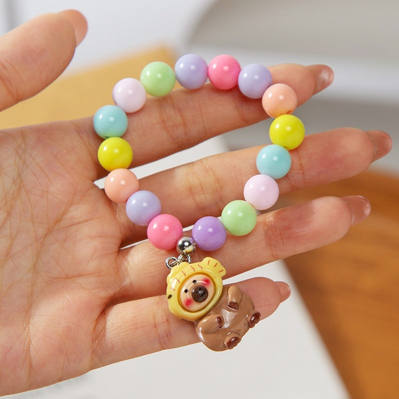 Colorful children's bracelet with crafted pendant Bowlift