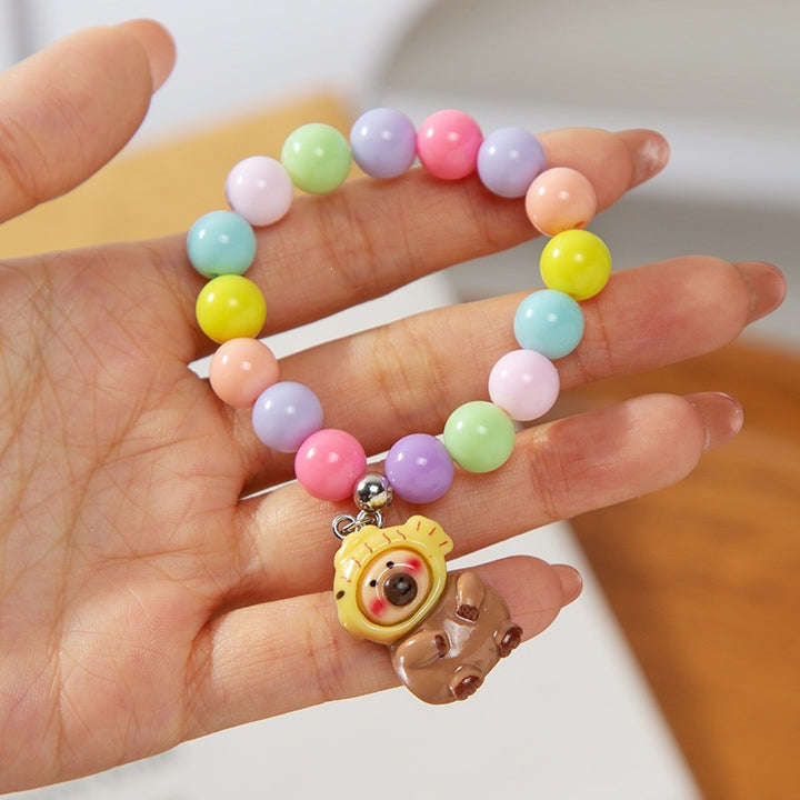 Colorful children's bracelet with crafted pendant Bowlift