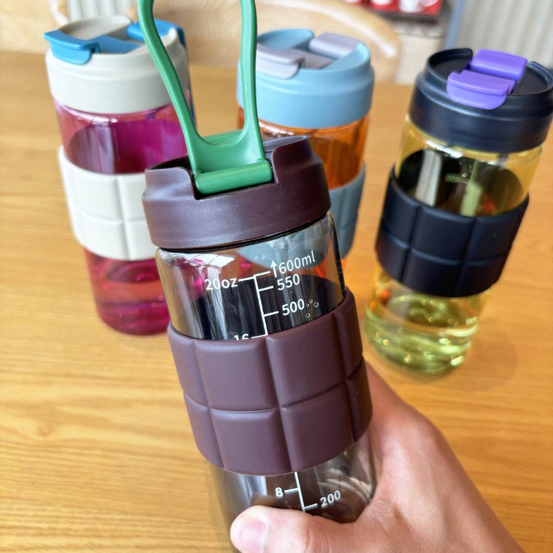 Women's transparent drinking bottle with non-slip silicone coating Bowlift