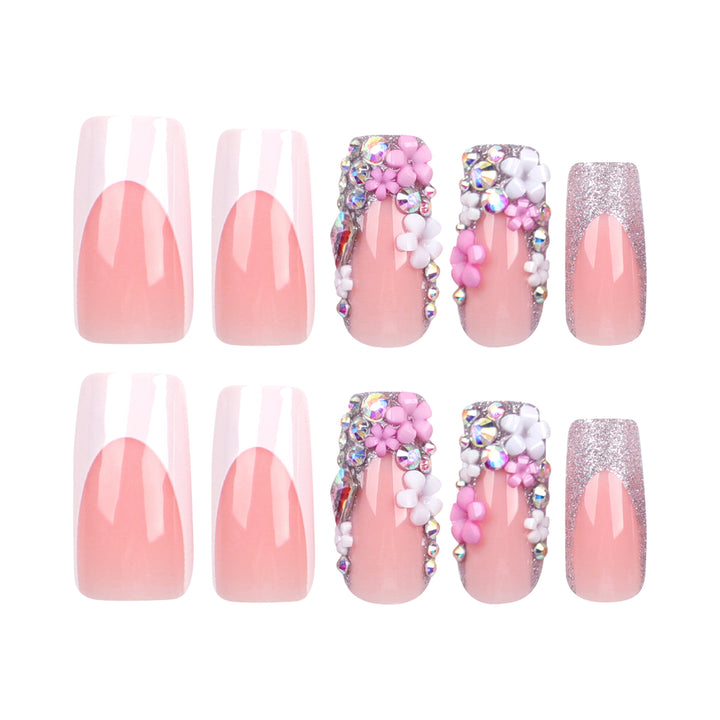 Artificial nails with floral decorations and glitter effects Bowlift